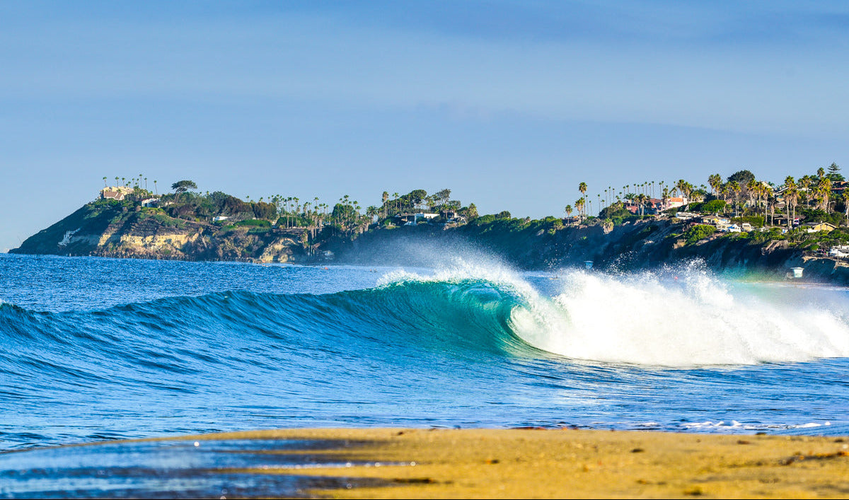 I shot this image of the high tide runner with a 150-600 mm lens. The wave is actually breaking in front of Las Olas, but it a[appears as it may be Cardiff Reef. This is by far one of my favorite shots.